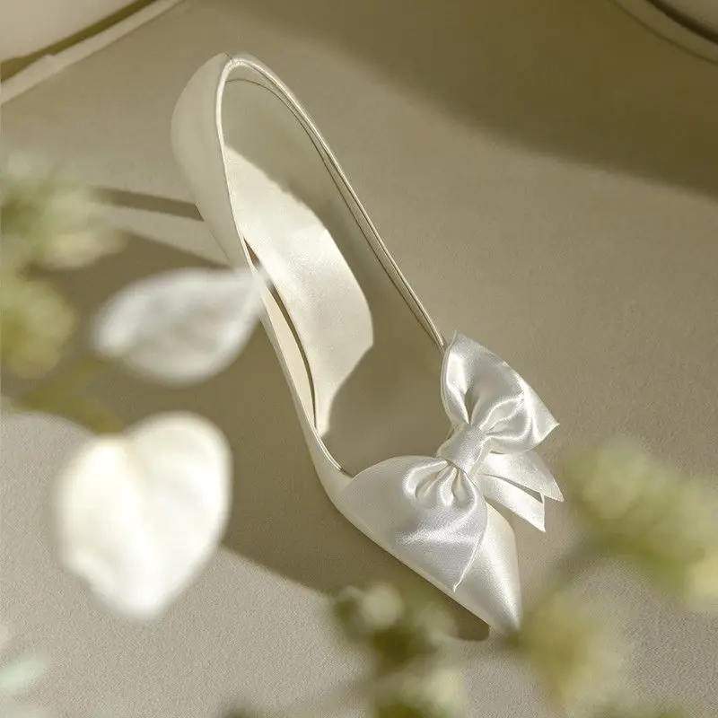 white heels with bows